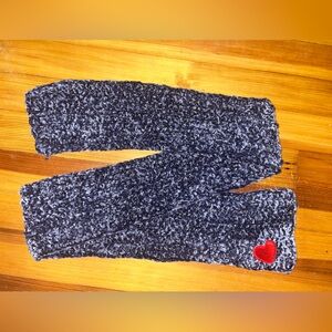 Extremely soft winter scarf with heart patch. Shown with and without flash photo